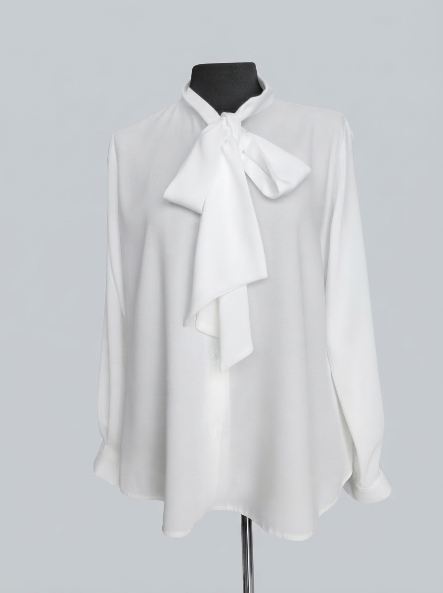 Bluza alba de dama cu maneca lunga si esarfa la gat.