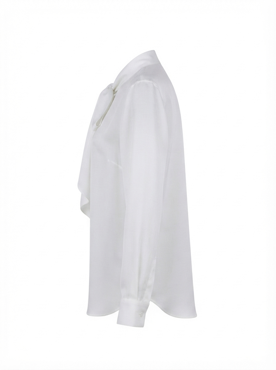 Bluza alba de dama cu maneca lunga si esarfa la gat.